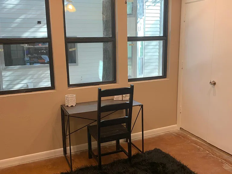 Flex space, workout area or office with storage closet