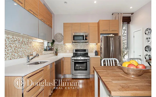 Sold by Douglas Elliman | media 10