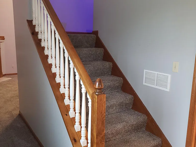 Staircase leading up to 2nd floor loft and bedrooms