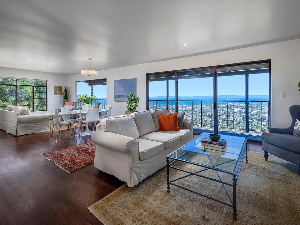 Open livingroom and diningroom with 180 degree views of the Ocean, Islands and downtown Santa Barbara.