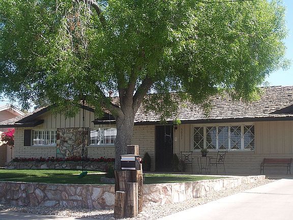 front of house / large shade tree