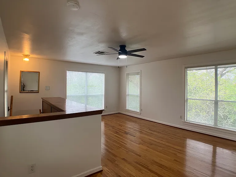 Upstairs bedroom, many large windows