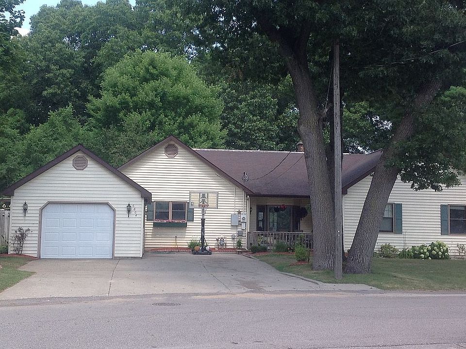 Front view of house, garage