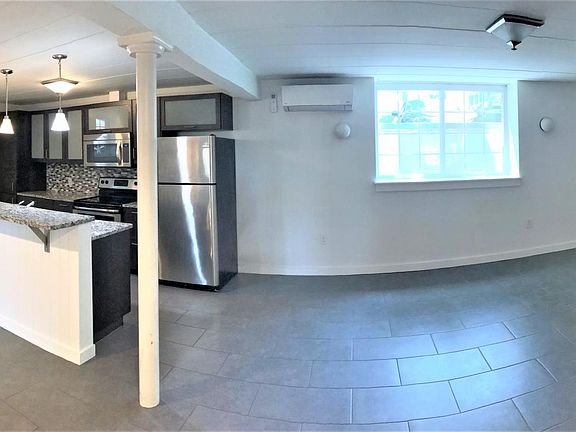 Pano of kitchen + living room