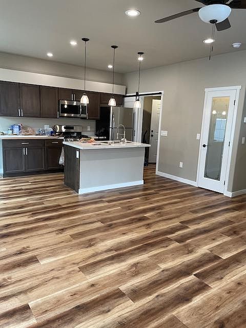 Glass door to pantry nicely appointed kitchen with all stainless steel appliances