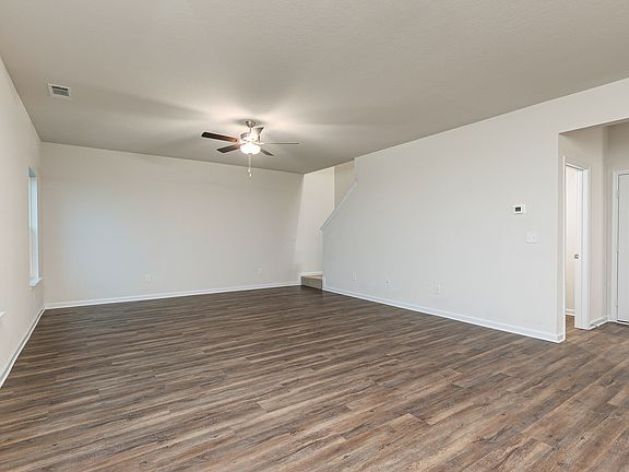 This expansive living room offers plenty of natural light.