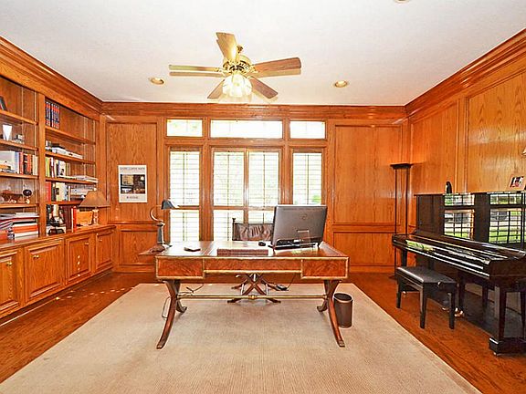 The right of the entry through the French Doors is your "Executive" Study! High Ceilings appointed w