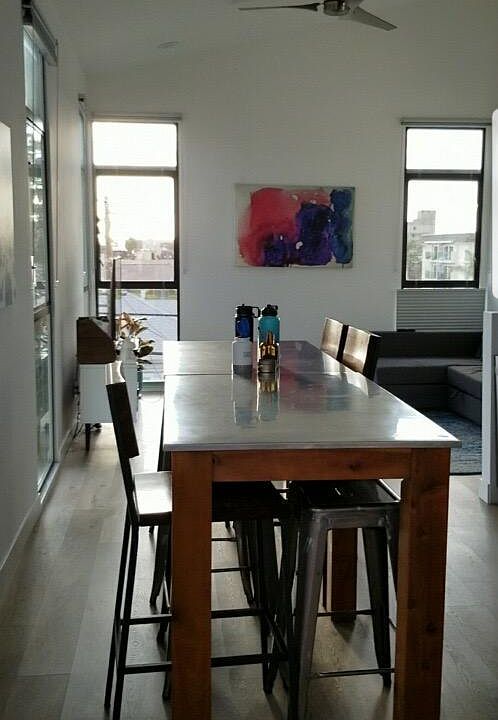 Dining area looking into living room
