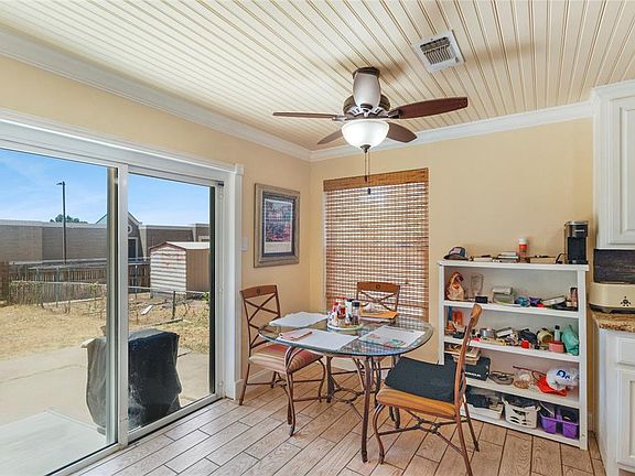 Full view of Dining with full view of Back Door