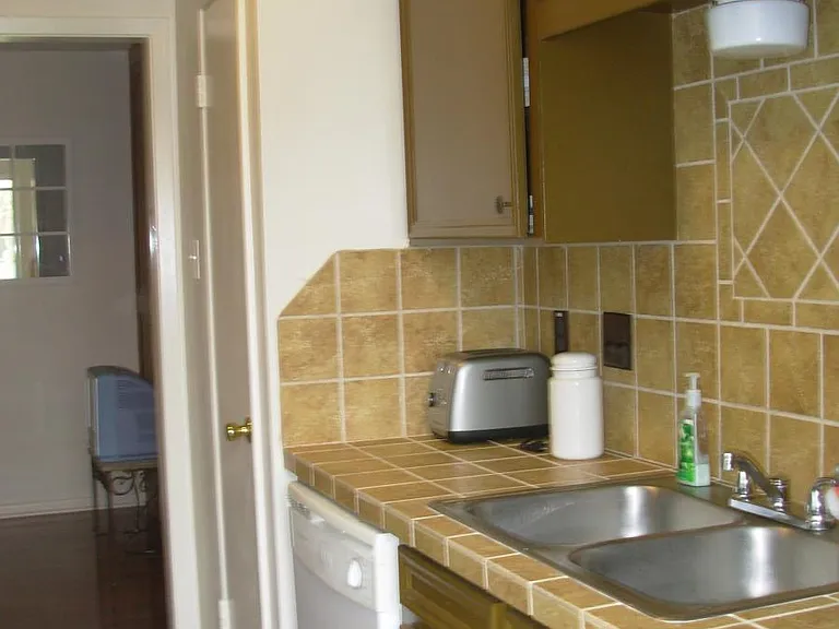 Kitchen with Tiled Counters & Flooring