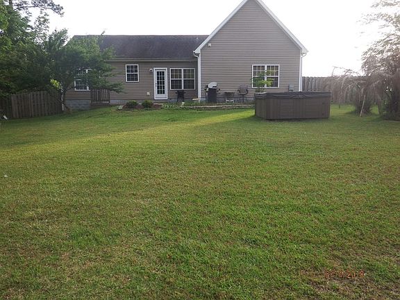 Hot tub in private back yard
