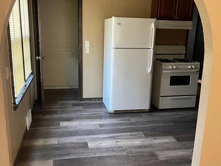 Recently redone kitchen flooring/cupboards.