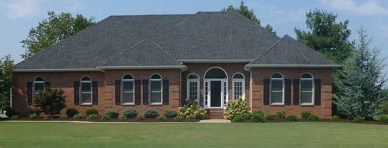 2703 Howell Drive, located on large corner lot in The Hamptons Subdivision Sec 1