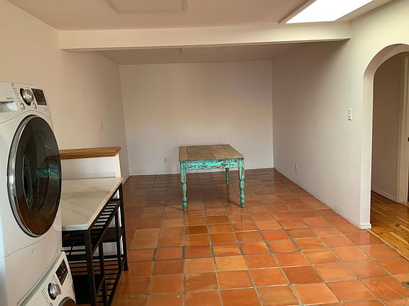 Looking from the kitchen towards the dining room. Saltillo tile deep cleaning and resealed.