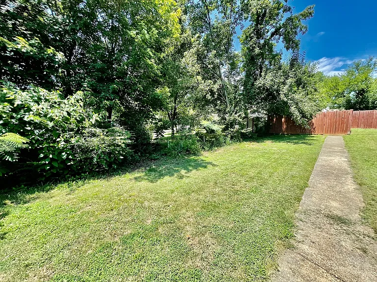 LARGE FENCED IN BACKYARD!