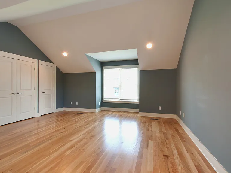 The primary bedroom has two large closets. Door in picture are to the smaller of the two