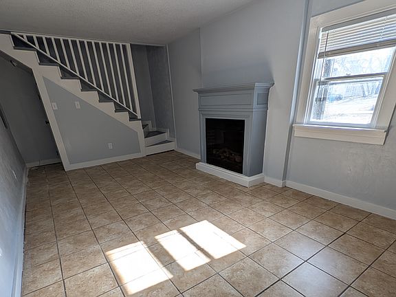 Sunny living room with fireplace