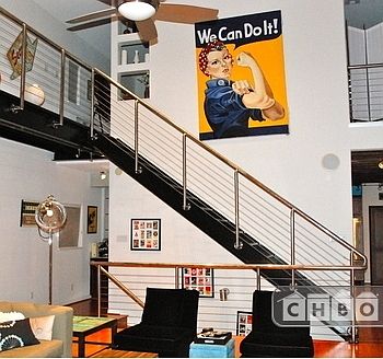 Wide open space with catwalk and loft master bedroom over li