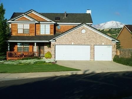 Home Located on Large Corner Lot with Pikes Peak in Rear
