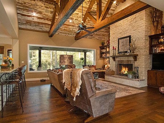 The family room ceiling is absolutely breathtaking! It is made from distressed wood from an 1800's barn in Pennsylvania!