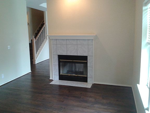 Family, Fireplace & Stairway