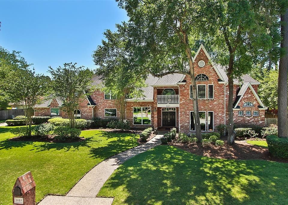 This home has all brick siding, brand new picturesque double pane windows, on a professionally landscaped double lot.