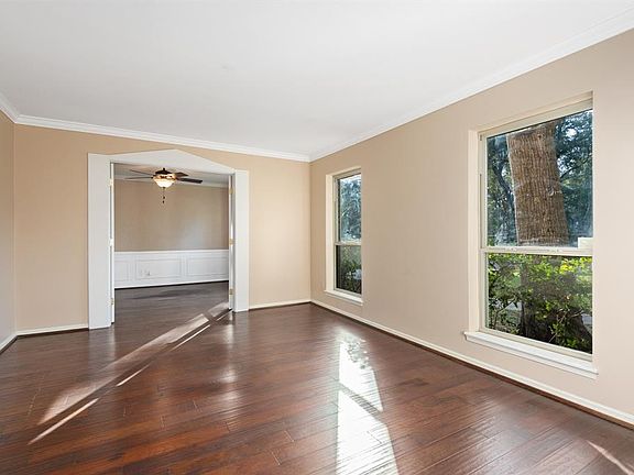 Home features formal living room and formal dining room.