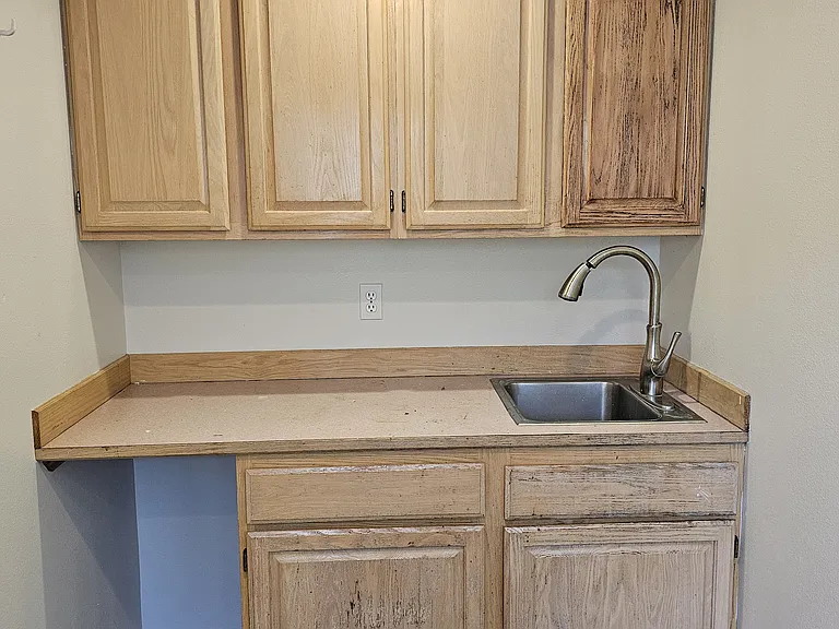 Good storage space in laundry room.
