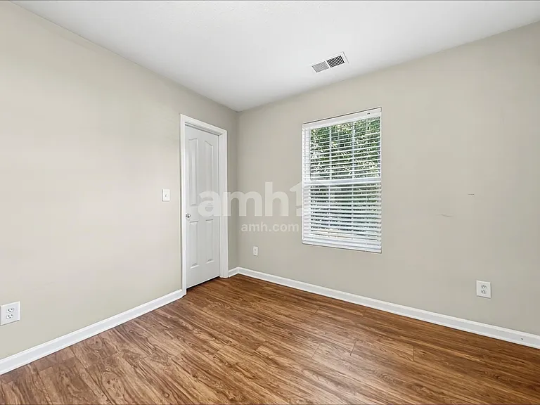 7033 Sunman Rd — Photo 11