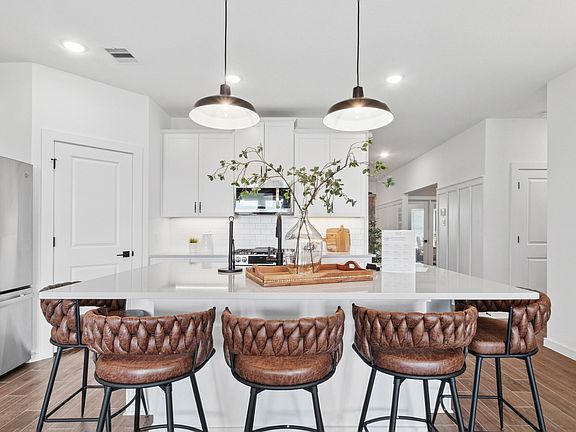 Kitchen with matte black pendant lighting