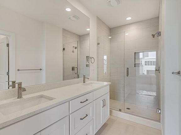 Full bathroom with his and her sinks in a sego home