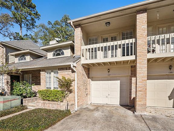 The townhome has it's very own attached 1-car garage. Additionally, you are able to park in the space behind the garage (underneath the balcony) along with there also being some additional parking located in unassigned parking areas of the community.