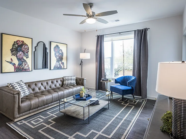 Living Room with Wood Style Flooring, Ceiling Fan, and Large Windows