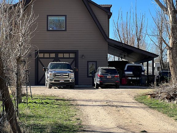 Front view of house built like a Barndominium - Home is upstairs - downstairs is equipment storage for owner - Tenants get the run of the property except the pastures and east side stalls for manager's horses).