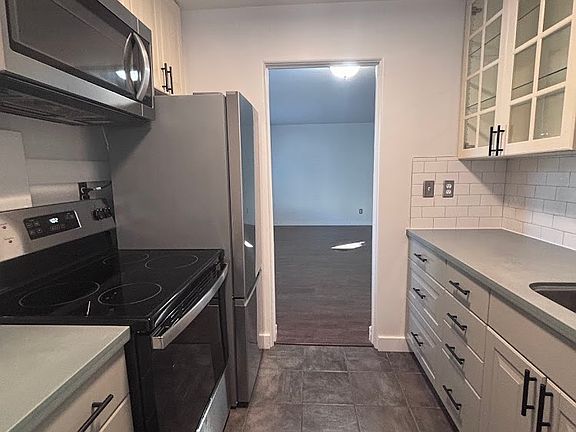 Kitchen, looking into living room space