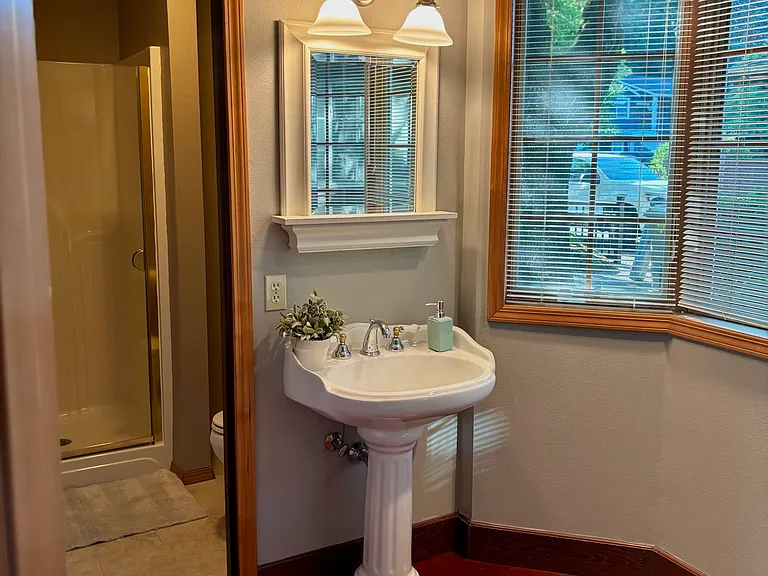 Bathroom #3 with separate shower/toilet area.
