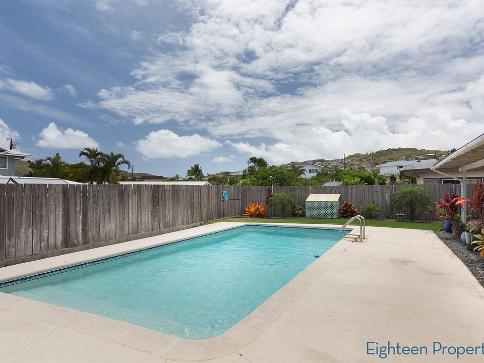 4 Bedroom 2 Bath Single Level w/2-car carport, pool, fenced yard