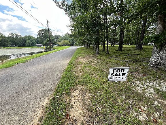 On Corner across from pond