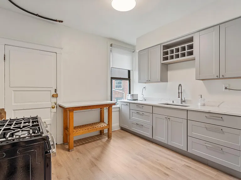 Fully equipped New Kitchen with GE gas cooktop, MW, DW as well as Toaster, Coffee Maker, etc.