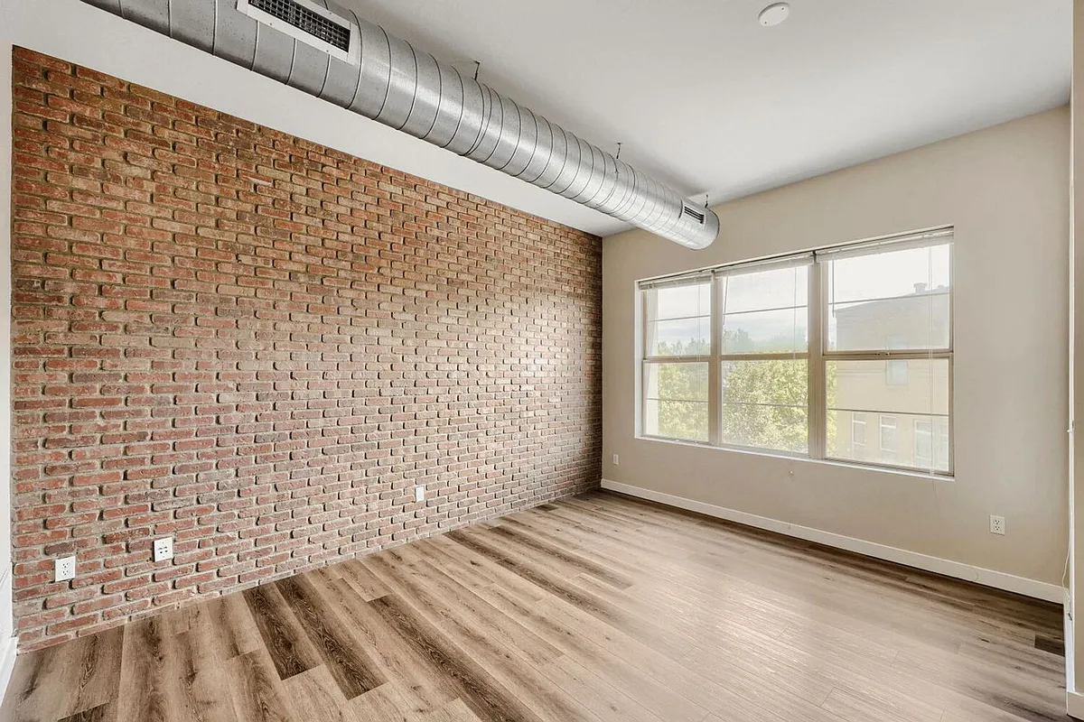 Building Photo - 7700 E 29th Ave #310