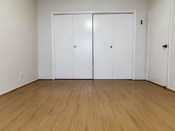 Bedroom has small outdoor deck (not shown)