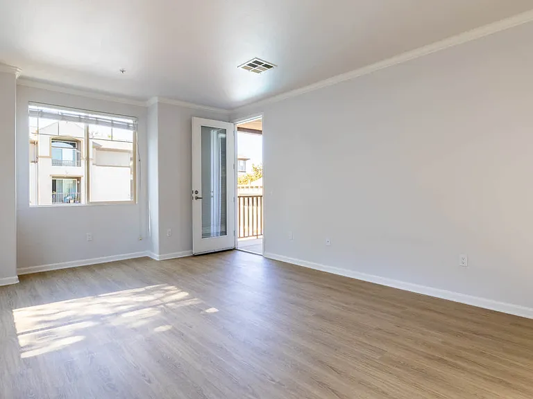 Living Room with Balcony and Hard Surface Flooring