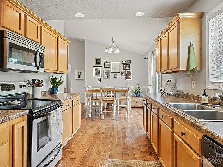 Original kitchen. Kitchen is now light blue.