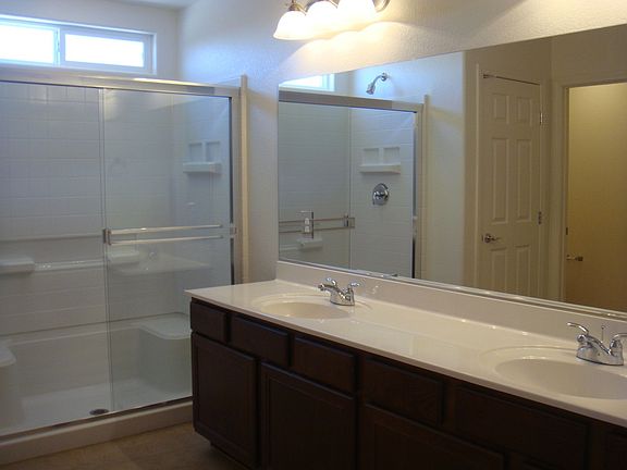 Master Bath Has Dual Sinks & Walk-In Shower