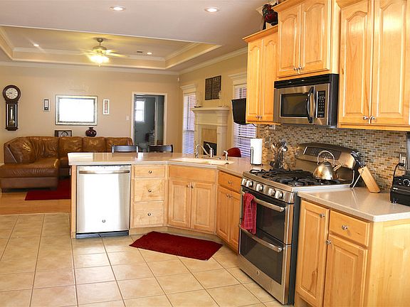 Kitchen Looks Into Great Room
						:
						Upgraded new dishwasher and gas range with dual ovens