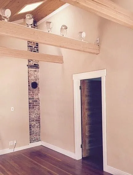 Main living w/vaulted ceiling and skylights