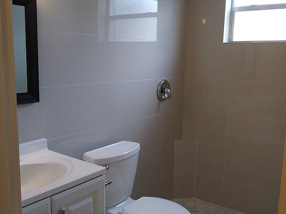 Totally remodeled bathroom with spacious shower and beautifu