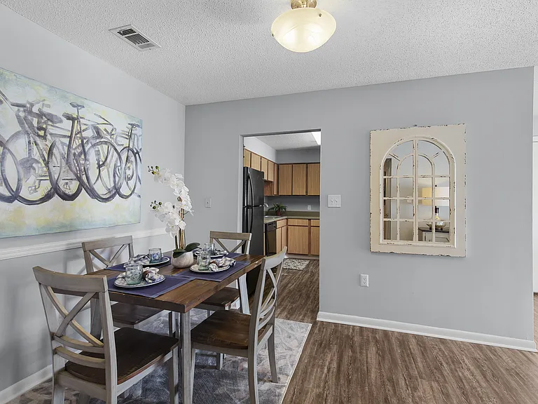 Intimate dining spaces with charming details at Lakeland East Apartments in Flowood, MS. Managed by Highlands Vista Group.