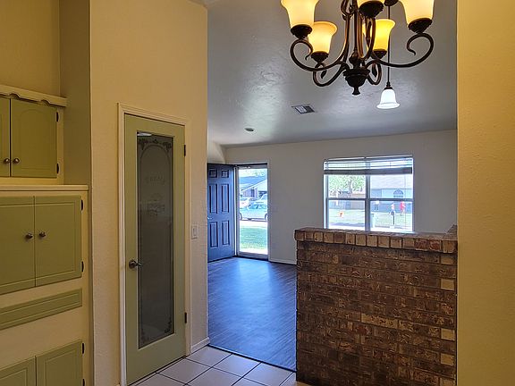 Looking from the kitchen/dining room into the living area