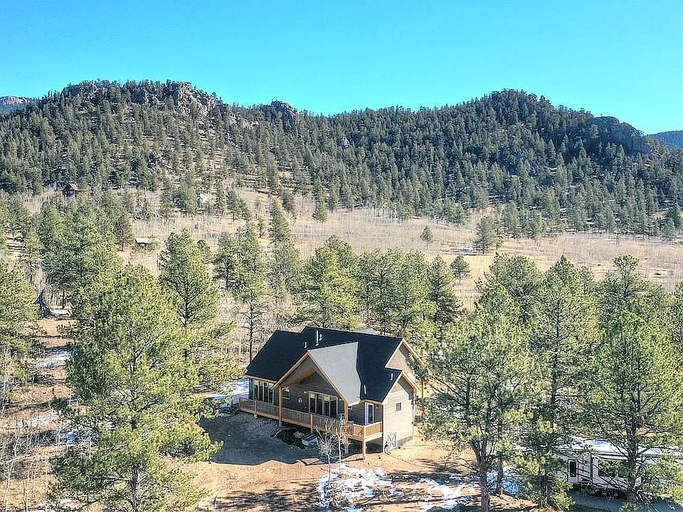 private lot nestled up to the national forest